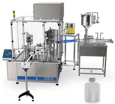 ADM-GP, filling liquids through spout for premade packets
